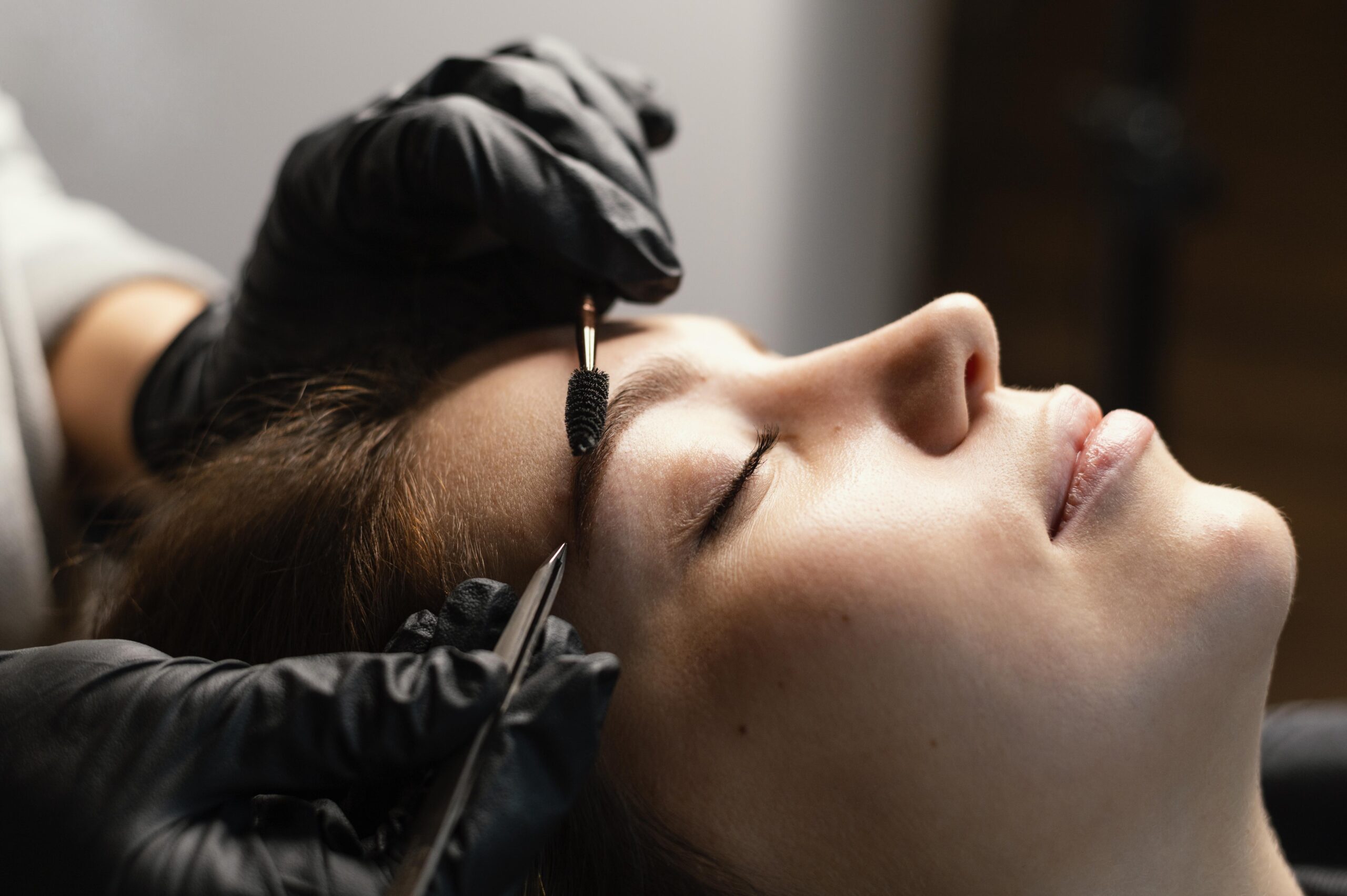 Home 2 Side View Female Specialist Doing Eyebrow Treatment Woman